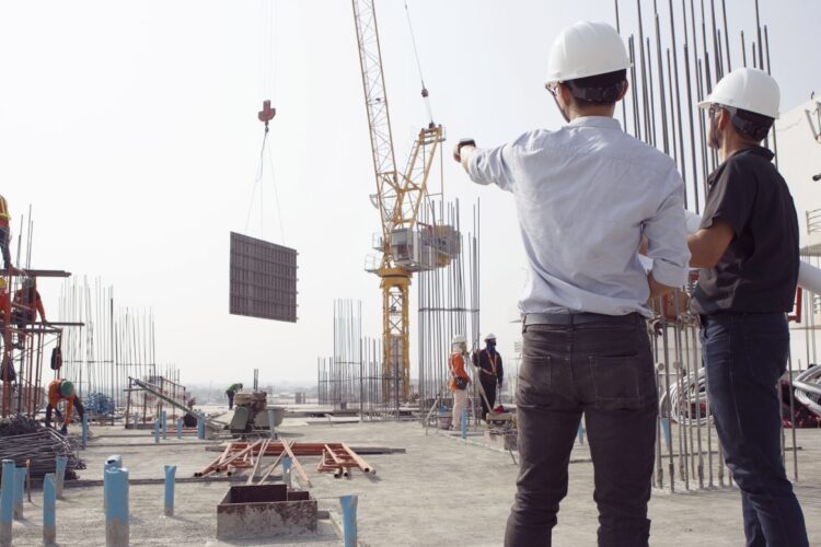 Project Management Consultant team at construction site